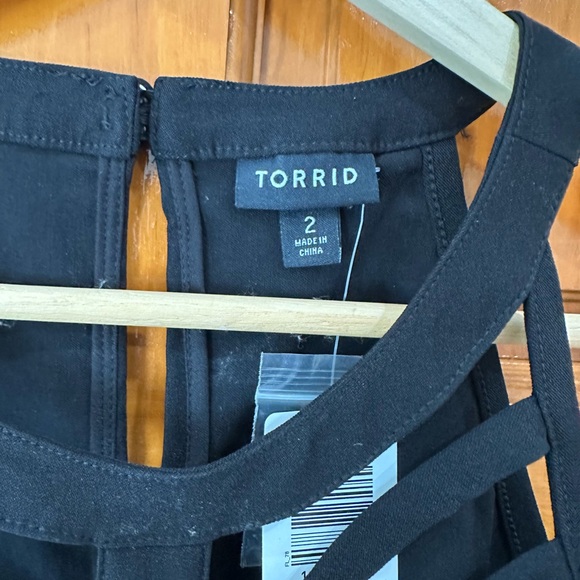 Black Bengaline Caged High Neck Peplum Top - Picture 6 of 8